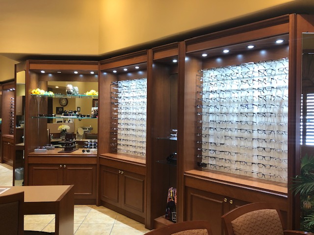 Accepted Insurance | wall of eye glasses in lobby
